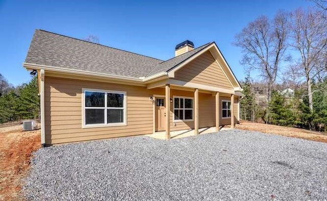 back of property with a patio and cooling unit