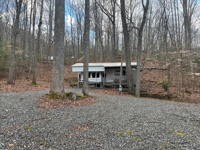 142 Gander Gap Rd, Hiawassee, GA 30546 - manufactured / mobile home featuring metal roof, a carport, and a porch