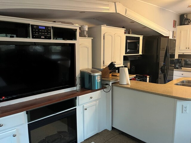 142 Gander Gap Rd, Hiawassee, GA 30546 - kitchen with built in microwave, wall oven, white cabinets, and a sink