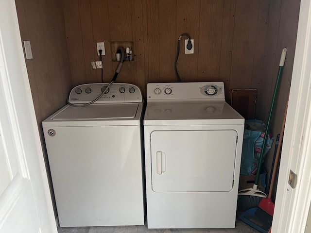 142 Gander Gap Rd, Hiawassee, GA 30546 - laundry area with washer and dryer, wooden walls, and laundry area
