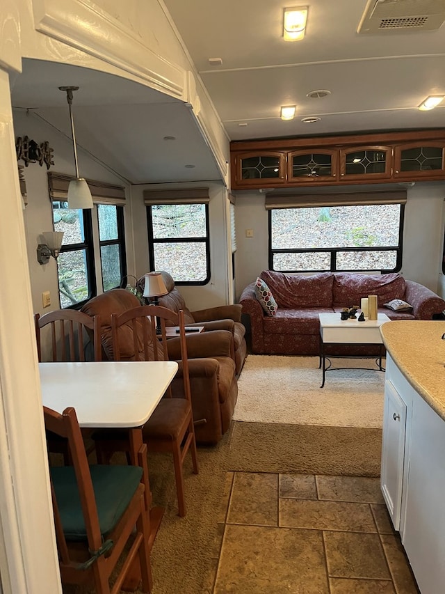 142 Gander Gap Rd, Hiawassee, GA 30546 - living area with visible vents and stone tile flooring