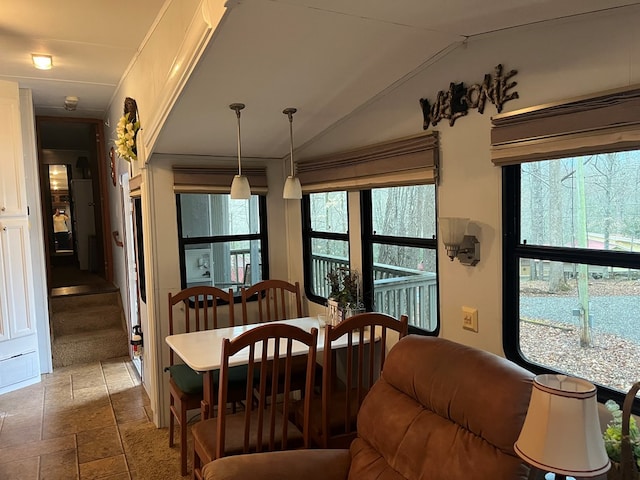 142 Gander Gap Rd, Hiawassee, GA 30546 - dining area featuring lofted ceiling and stone tile flooring