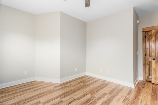 spare room with light wood-type flooring