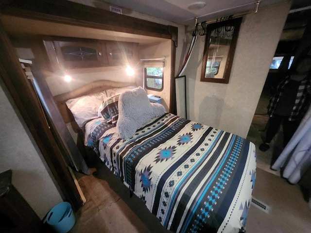 bedroom with visible vents