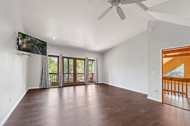 unfurnished room featuring a textured ceiling, ceiling fan, dark hardwood / wood-style floors, and lofted ceiling with beams