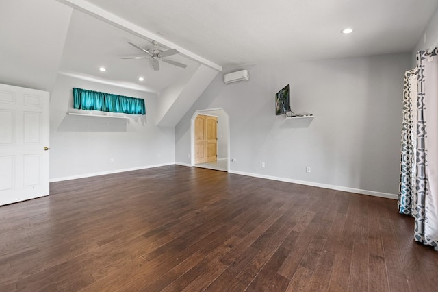 unfurnished living room featuring dark wood-type flooring, ceiling fan, lofted ceiling, and a wall unit AC