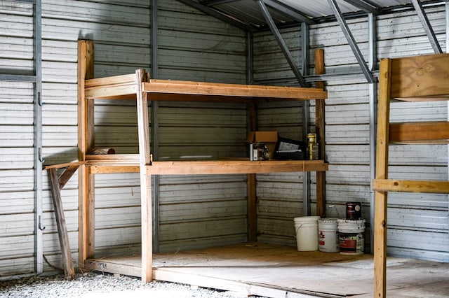 interior space featuring wooden walls