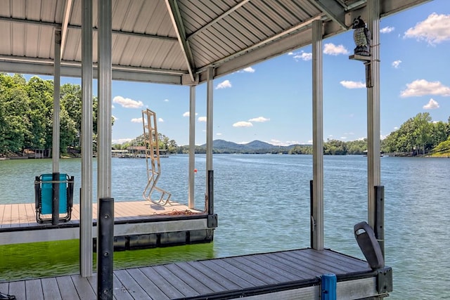 dock area with a water and mountain view