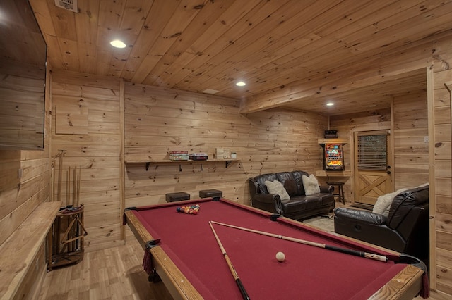 game room featuring wood walls, light wood-type flooring, wooden ceiling, and pool table