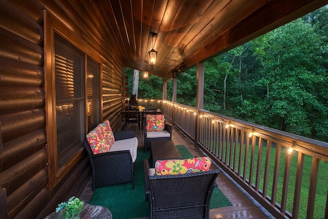 deck featuring outdoor lounge area