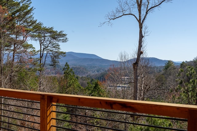 property view of mountains with a wooded view