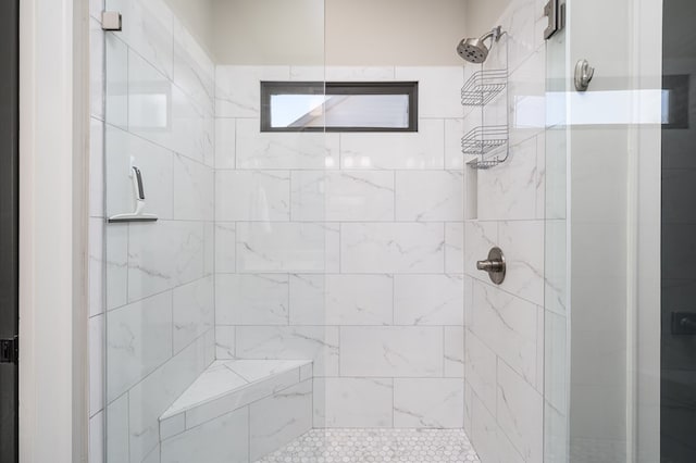 bathroom with a stall shower