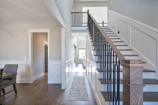 stairway with wood-type flooring