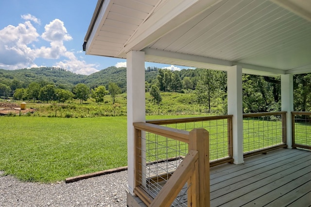 deck featuring a yard