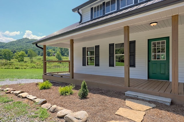 entrance to property featuring covered porch