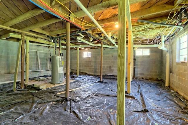 basement featuring electric water heater