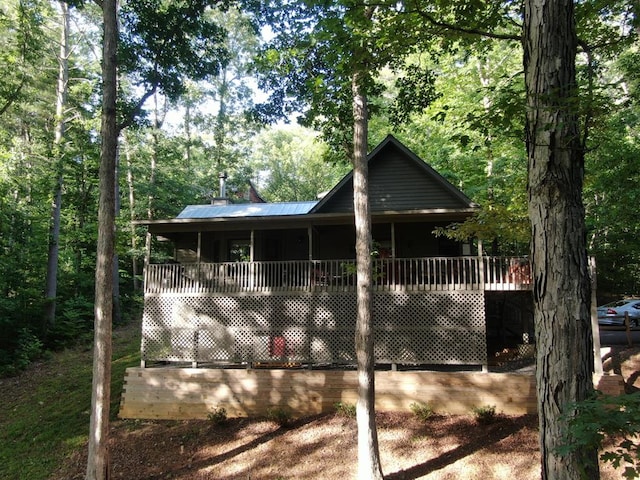 back of property with a deck