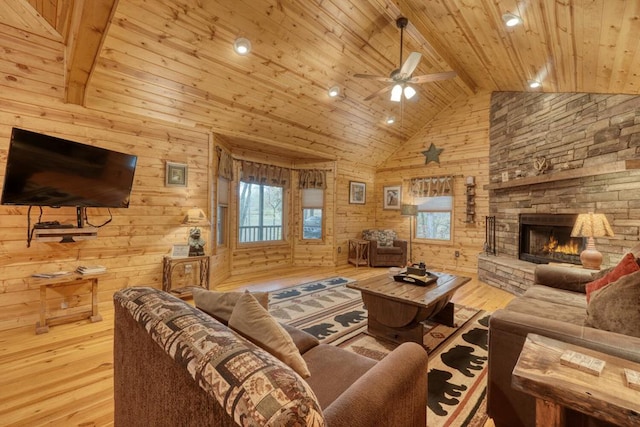 living room featuring beam ceiling, high vaulted ceiling, wooden ceiling, and light hardwood / wood-style flooring