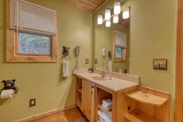 bathroom featuring vanity, wood ceiling, and wood-type flooring