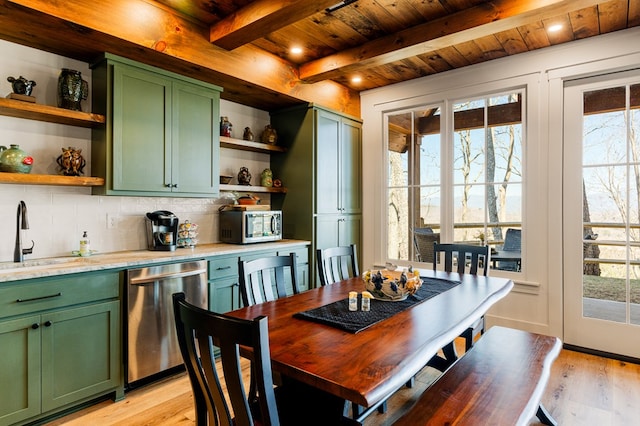 dining area with light wood finished floors, wood ceiling, and beam ceiling