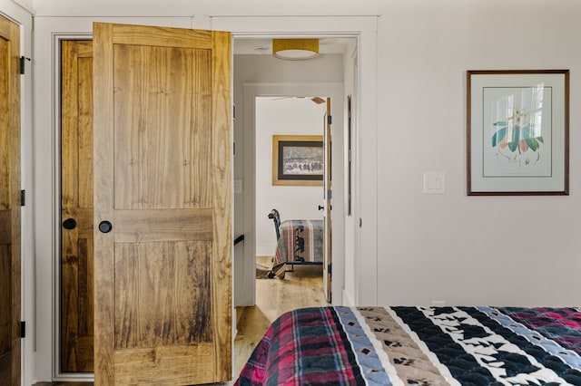 bedroom featuring wood finished floors