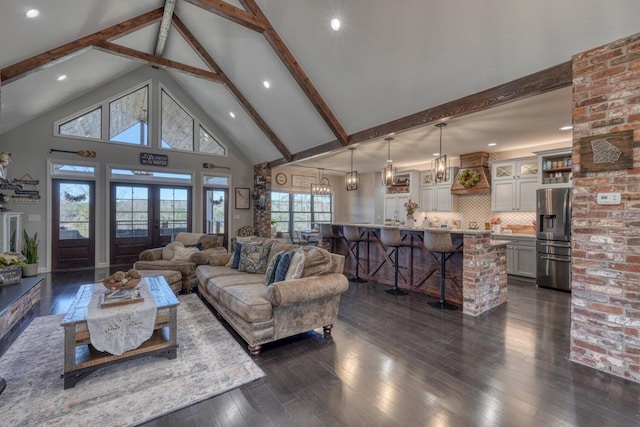 living room featuring high vaulted ceiling, dark wood finished floors, beam ceiling, and french doors