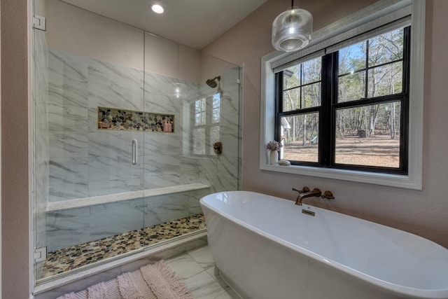 full bathroom with recessed lighting, marble finish floor, a freestanding tub, and a marble finish shower