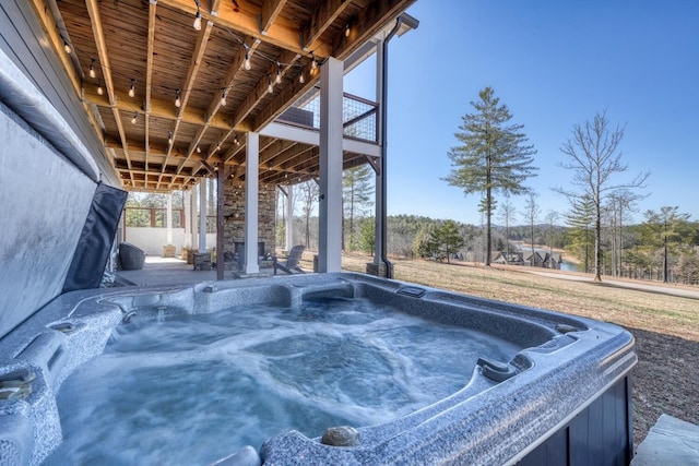 exterior space featuring a hot tub