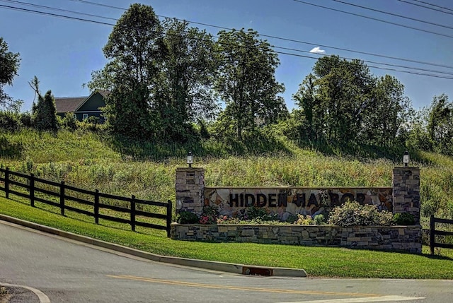 exterior space featuring fence and a yard