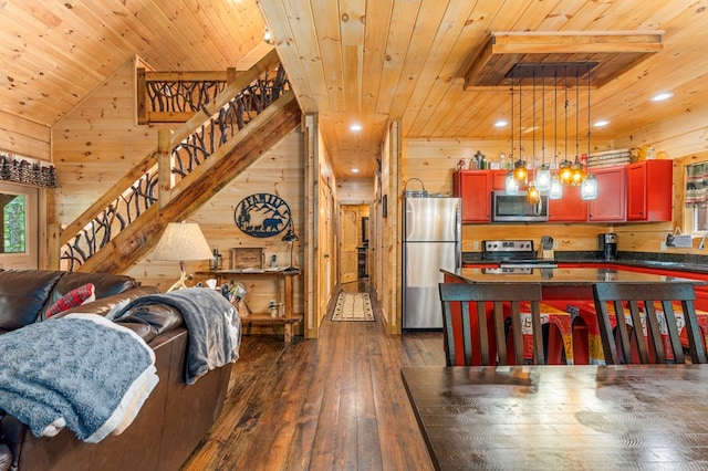 interior space featuring wood walls, dark hardwood / wood-style floors, and wood ceiling