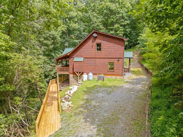 view of side of home featuring a deck