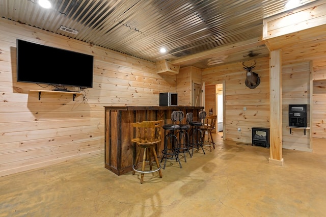 bar featuring wooden walls