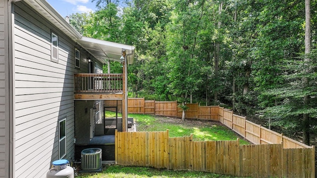 view of yard featuring central AC unit