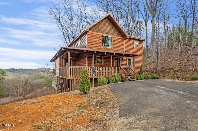 2420 Rainbow Falls Ln, Sevierville, TN 37862 - view of front of property featuring a porch and log veneer siding