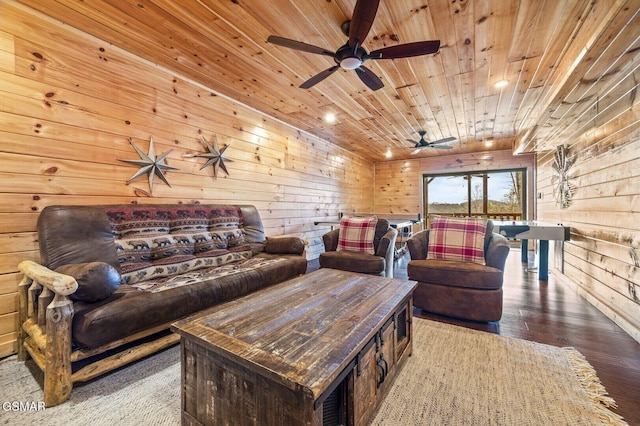 living room featuring wood walls, wooden ceiling, and hardwood / wood-style flooring