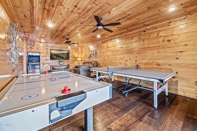 playroom with hardwood / wood-style floors, ceiling fan, wooden ceiling, and wood walls