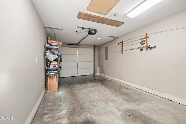 534 Shellbark Rd, Newport, TN 37821 - garage featuring electric panel and a garage door opener