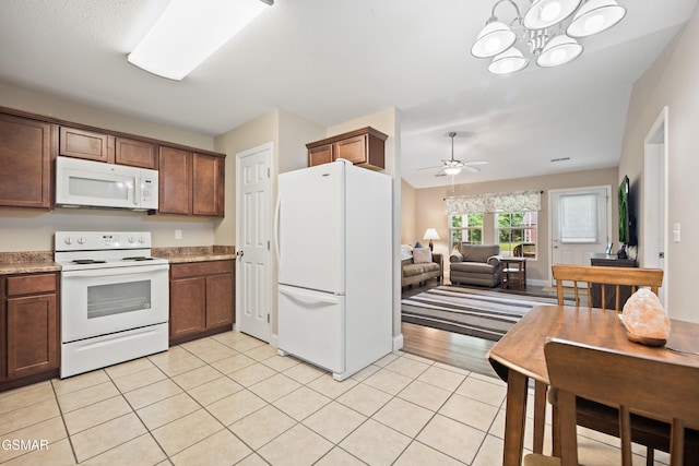 534 Shellbark Rd, Newport, TN 37821 - kitchen featuring white appliances, light tile patterned floors, ceiling fan, a chandelier, and light countertops