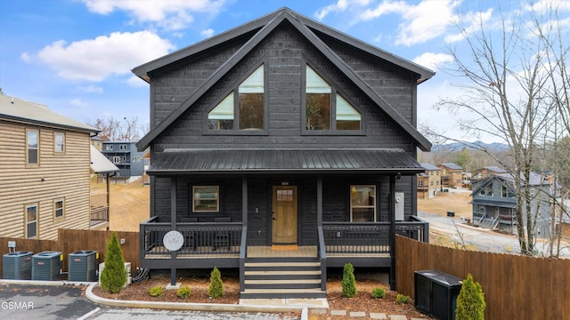 view of front of property featuring central AC unit and covered porch