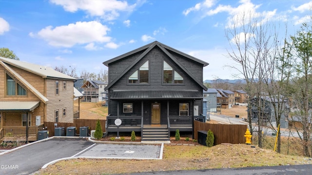 view of front of home featuring central AC and a porch