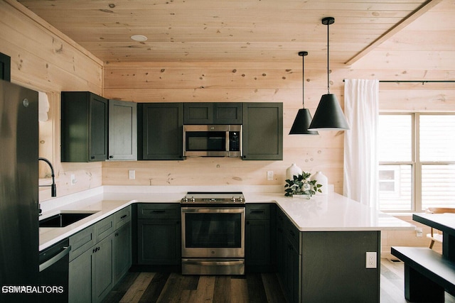 kitchen with pendant lighting, sink, wood ceiling, black appliances, and green cabinetry