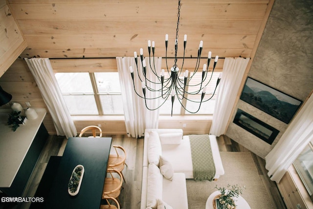 living room featuring hardwood / wood-style floors and a chandelier