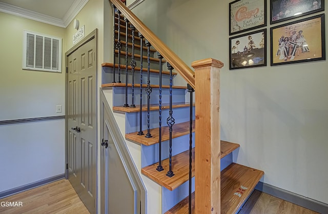 2846 Mountain View Cir, Sevierville, TN 37862 - stairway with ornamental molding and wood finished floors