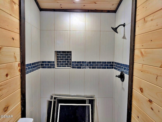 bathroom featuring a shower and wooden ceiling