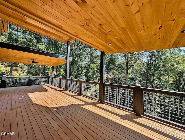 wooden terrace with ceiling fan