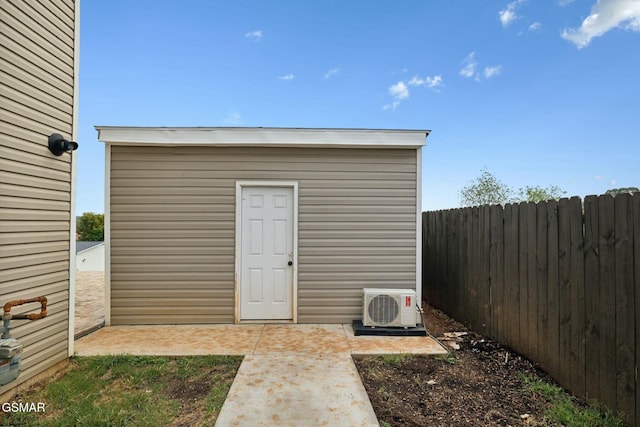 view of outdoor structure with ac unit