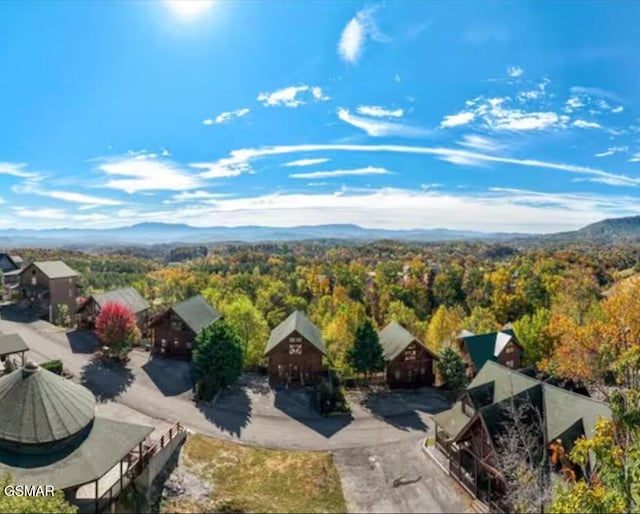 bird's eye view featuring a view of trees