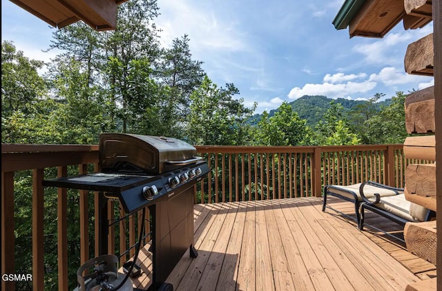 wooden deck with grilling area