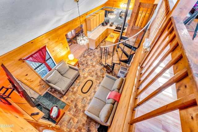 living area featuring wooden walls