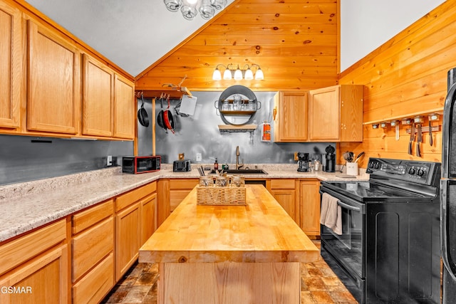 kitchen with a center island, black range with electric stovetop, wooden counters, vaulted ceiling, and a sink